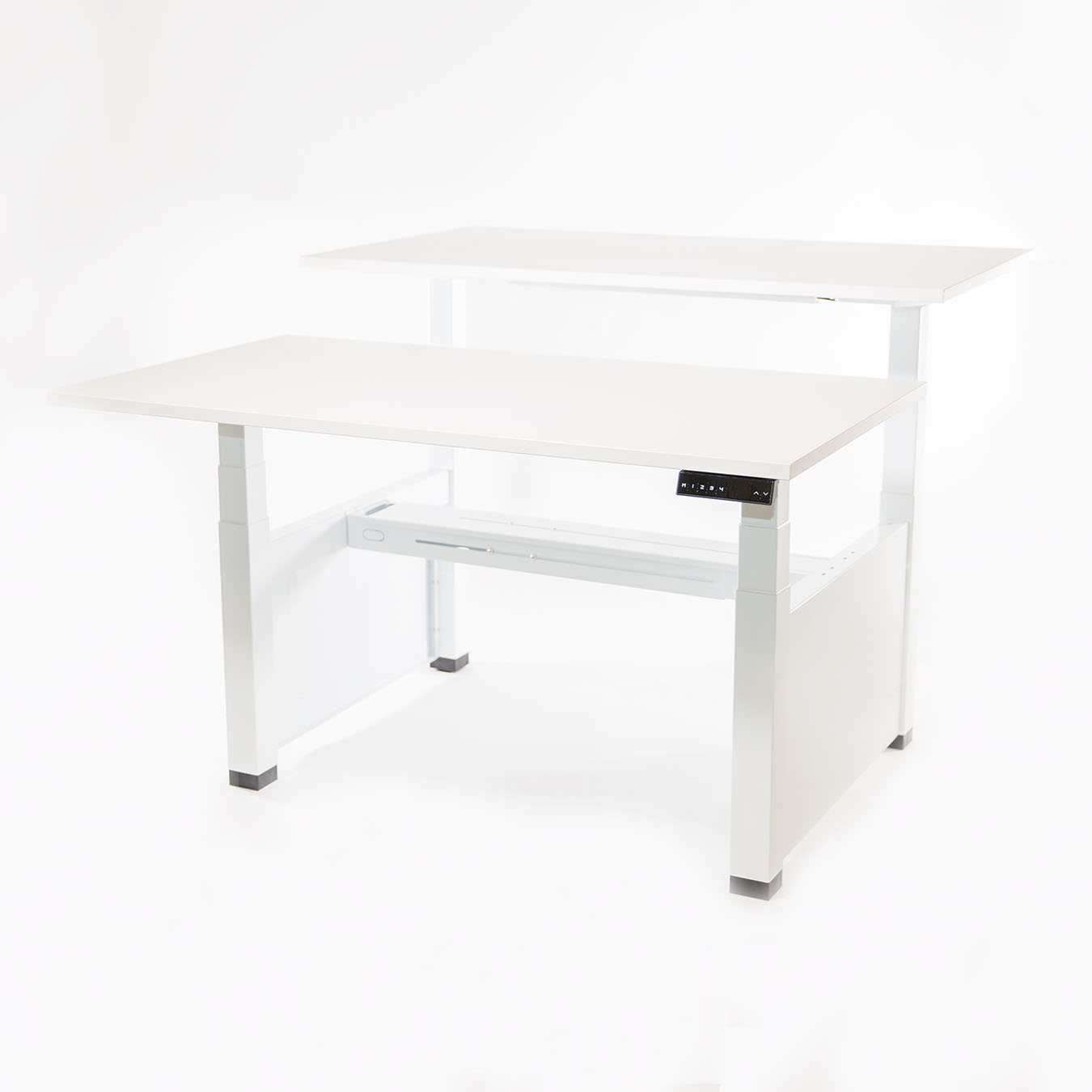 <h1>Duo</h1><p>2 werkplekken, met gedeeld onderstel en <br>onafhankelijk in hoogte verstelbaar</p>
